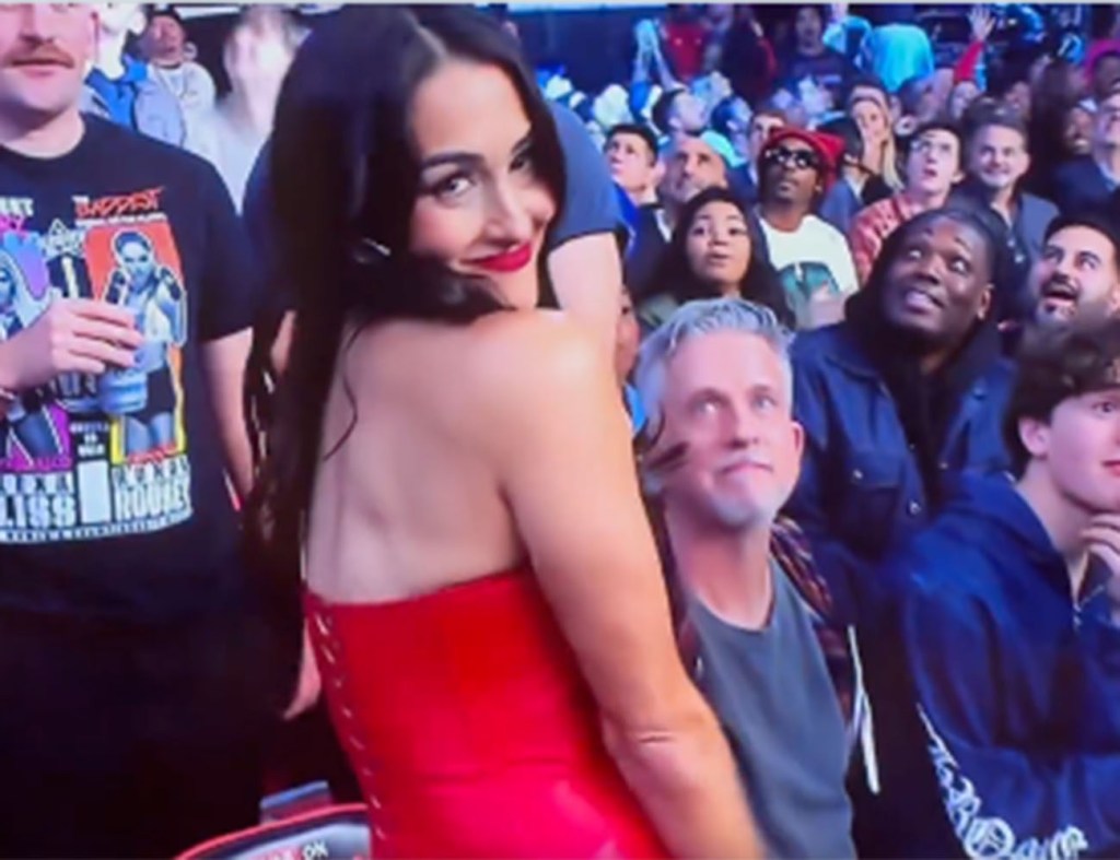 Nikki Bella gets honored by WWE as Bill Simmons is captured in the background at "Monday Night Raw" on Netflix on January 6, 2025.