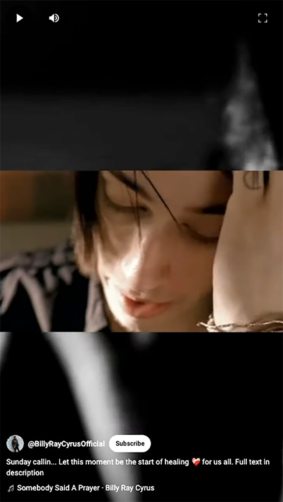 The country star posted a clip of a 2009 music video he made featuring his son, Trace Cyrus. Here, Trace holding his head with one hand, looking down. 
