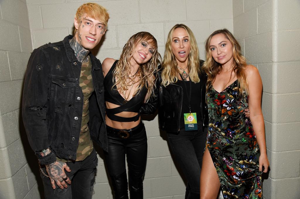 (L-R) Trace Cyrus, Miley Cyrus, Tish Cyrus and Brandi Cyrus pose backstage during the 2019 iHeartRadio Music Festival at T-Mobile Arena on Sept. 21, 2019, in Las Vegas.
