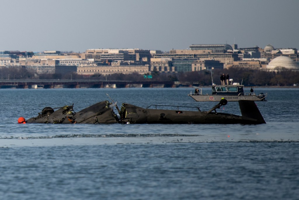 In this image provided by the U.S. Coast Guard, wreckage is seen in the Potomac River near Ronald Reagan Washington National Airport, Thursday, Jan. 30, 2025 in Washington.