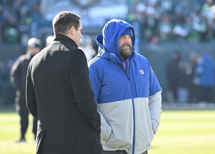 Brian Daboll (R.) and Joe Schoen speak prior to the Giants-Eagles game on Jan 5, 2024.