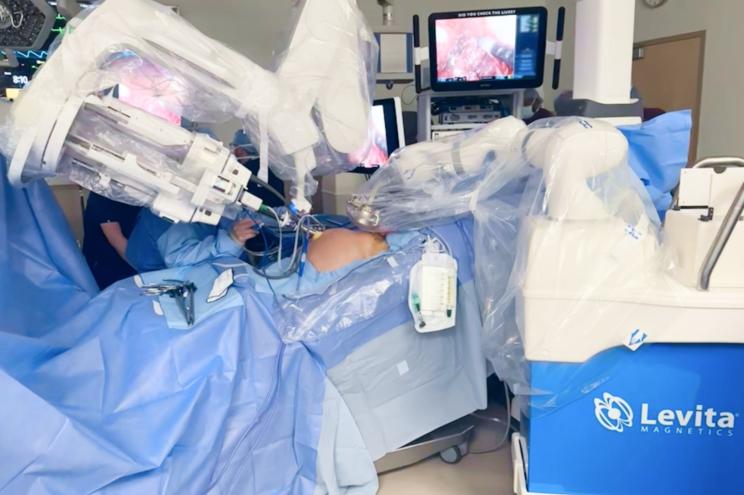 The world's first dual-robotic prostate removal was performed last month in Texas. The da Vinci single-port robotic system is on the left, and the Levita MARS system is in sync with it on the right.