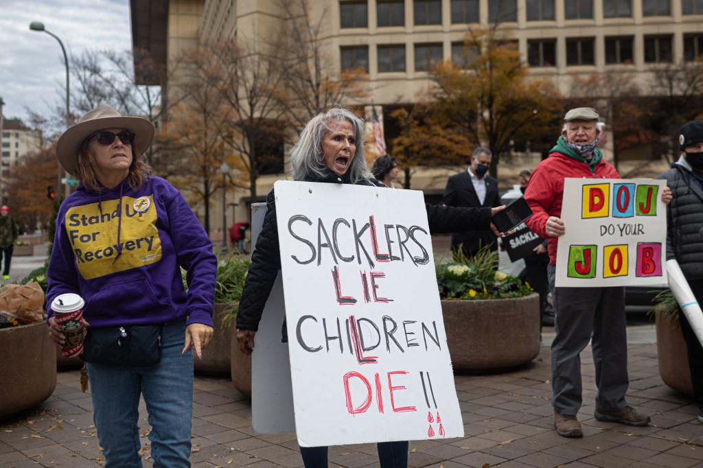 People protesting against the Sacklers in 2021.