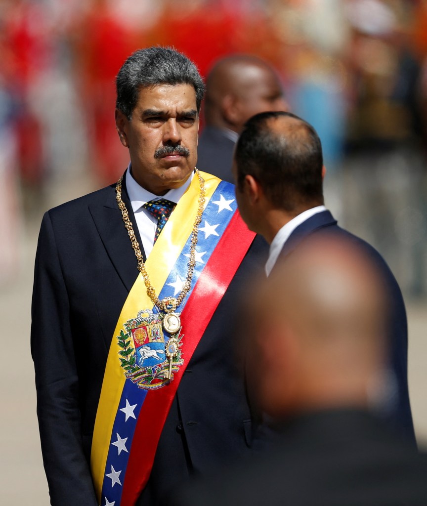 President Nicolas Maduro wearing a sash and gold medal at his third term inauguration at a military academy in Caracas, Venezuela