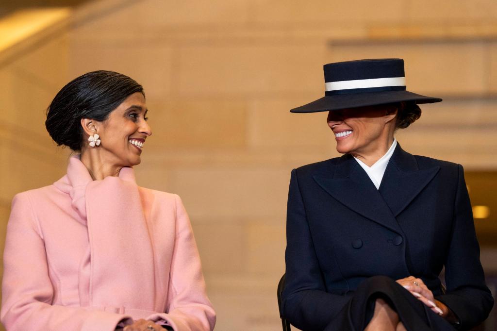 Usha Vance and Melania Trump smile at each other.