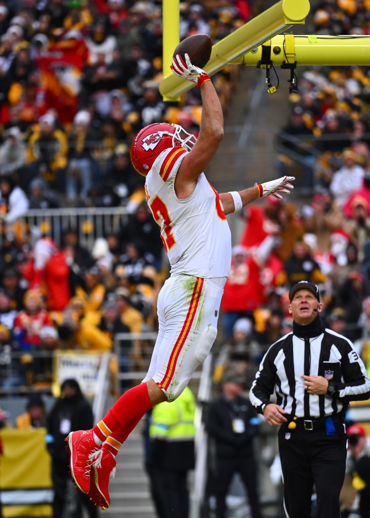 Travis Kelce of the Kansas City Chiefs celebrating a touchdown during a game against the Pittsburgh Steelers at Acrisure Stadium