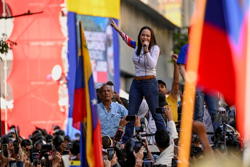 Venezuelan opposition leader Maria Corina Machado addressing supporters at an anti-government protest in Caracas, ahead of President Nicolas Maduro's third term inauguration