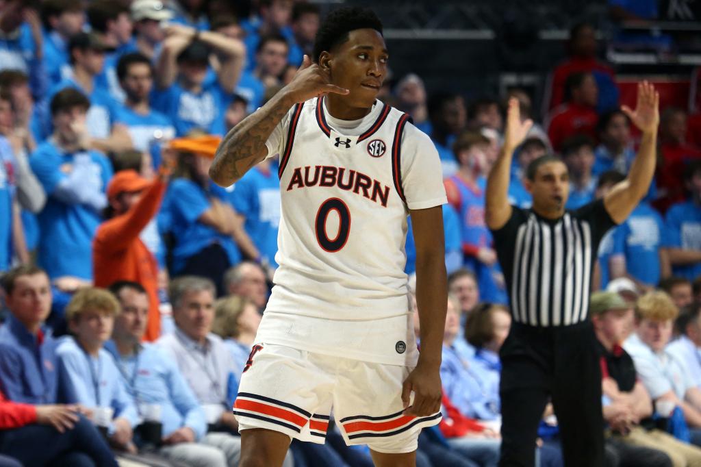 Auburn Tigers guard Tahaad Pettiford (0) reacts after a three point basket during the second half against the Mississippi Rebels at The Sandy and John Black Pavilion at Ole Miss. 