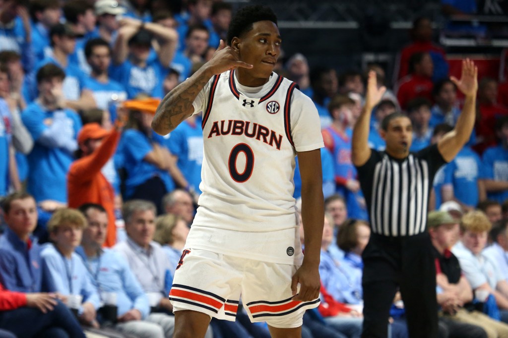 Auburn Tigers guard Tahaad Pettiford (0) reacts after a three point basket during the second half against the Mississippi Rebels at The Sandy and John Black Pavilion at Ole Miss. 