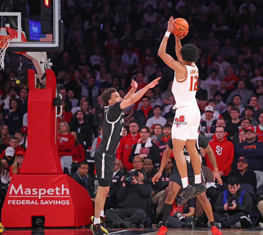 RJ Luis Jr. #12 of the St. John's Red Storm puts up a shot as Jabri Abdur-Rahim #3 of the Providence Friars is too late to defend during the first half when the St. John's Red Storm played the Providence Friars Saturday, February 1, 2025 at Madison Square Garden in Manhattan, NY. 