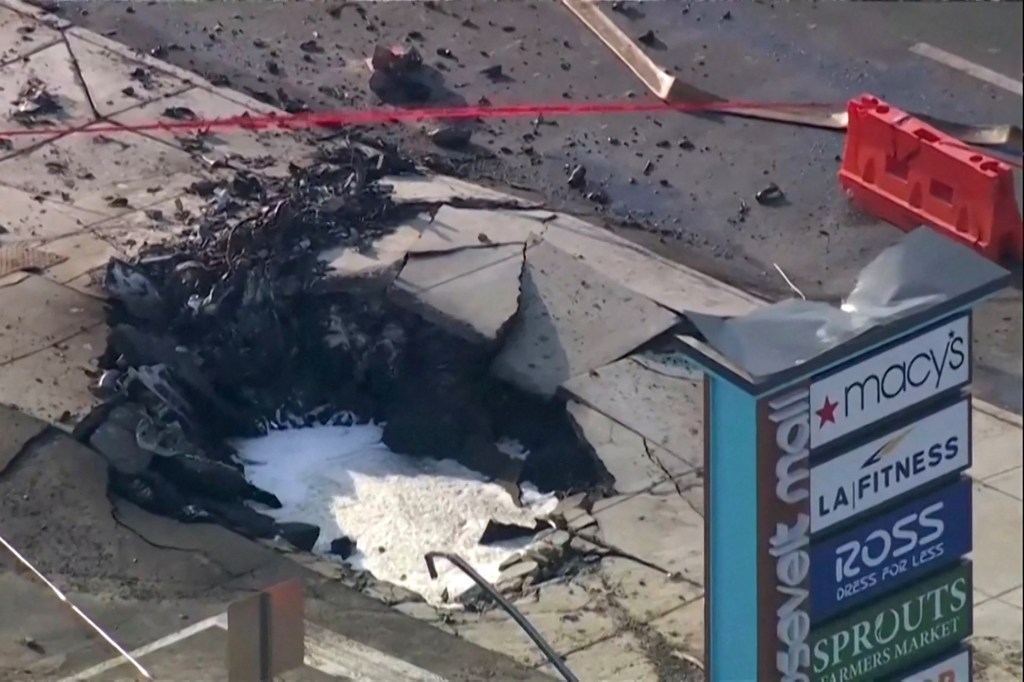 A crater seen in the ground a day after the plane crash.