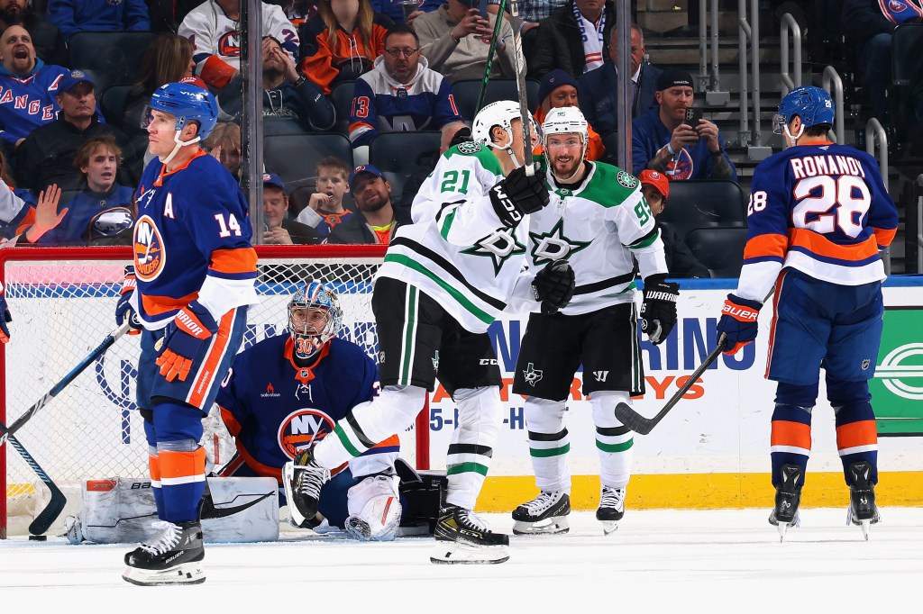 Jason Robertson of the Dallas Stars (c) celebrates his goal at 17:21 of the second period to record a natural hattrick with three against the New York Islanders in one period at UBS Arena on February 23, 2025 in Elmont, New York. 