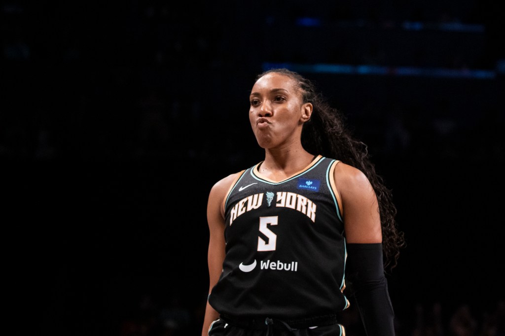 Kayla Thornton #5 of the New York Liberty reacts after 3 pointer against the Connecticut Sun