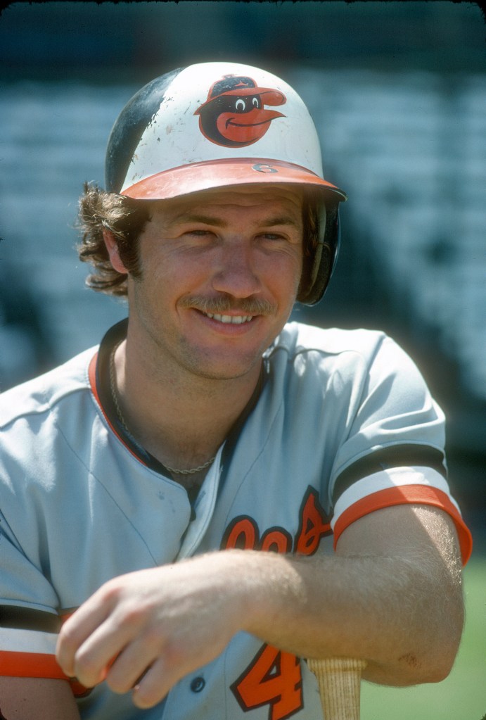 Rich Dauer #25 of the Baltimore Orioles takes the throw down at second base against the Kansas City Royals during a Major League Baseball game circa 1983 at Memorial Stadium in Baltimore, Maryland. 