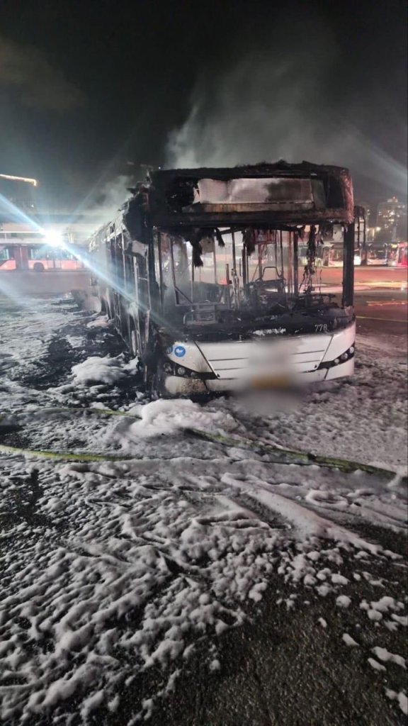 One of the burnt-out buses seen after the attack.