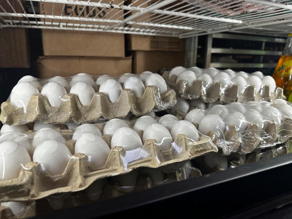 Cartons of eggs sit inside cooler at Norma's Sweets Bakery Tuesday, Feb. 11, 2025.