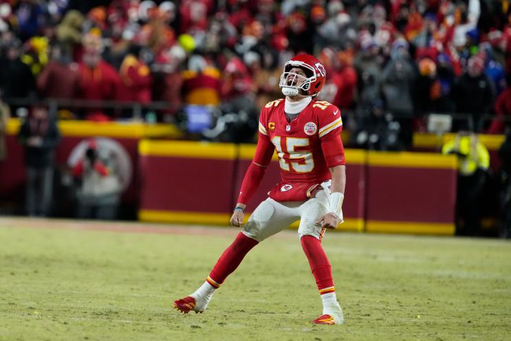 Chiefs quarterback Patrick Mahomes (15) celebrates after defeating the Buffalo Bills in the AFC Championship game, Sunday, Jan. 26, 2025