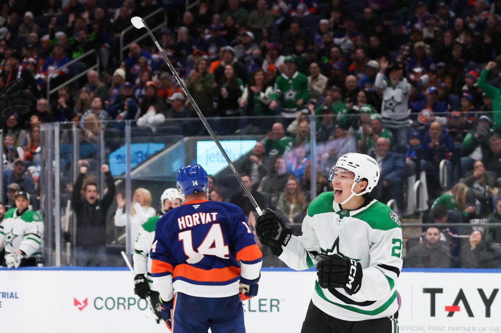 Dallas Stars' Jason Robertson celebrates after scoring while the Islander's Bo Horvat skates away during the second period of an NHL game at UBS Arena in Elmont, N.Y.