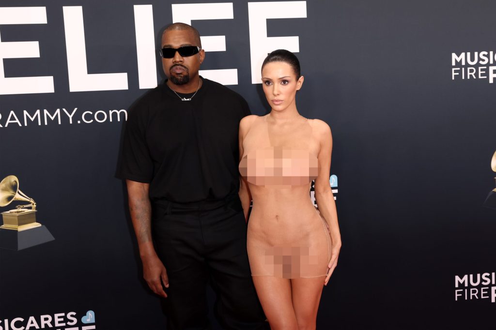 Kanye West and Bianca Censori attending the 67th Annual GRAMMY Awards in a controversial nude appearance on the red carpet
