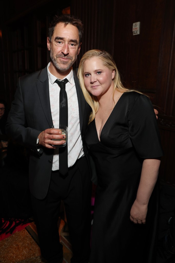 Chris Fischer and Amy Schumer at the "Kinda Pregnant" premiere in NYC on Feb. 3