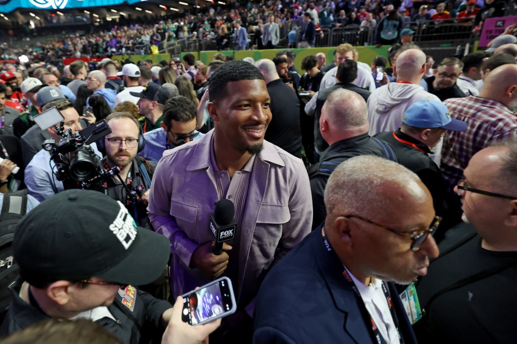 Former New Orleans Saints and current Cleveland Browns quarterback Jameis Winston makes his way through the crowd on the field inside the Caesars Superdome during the Super Bowl Opening Night on February 3, 2025.