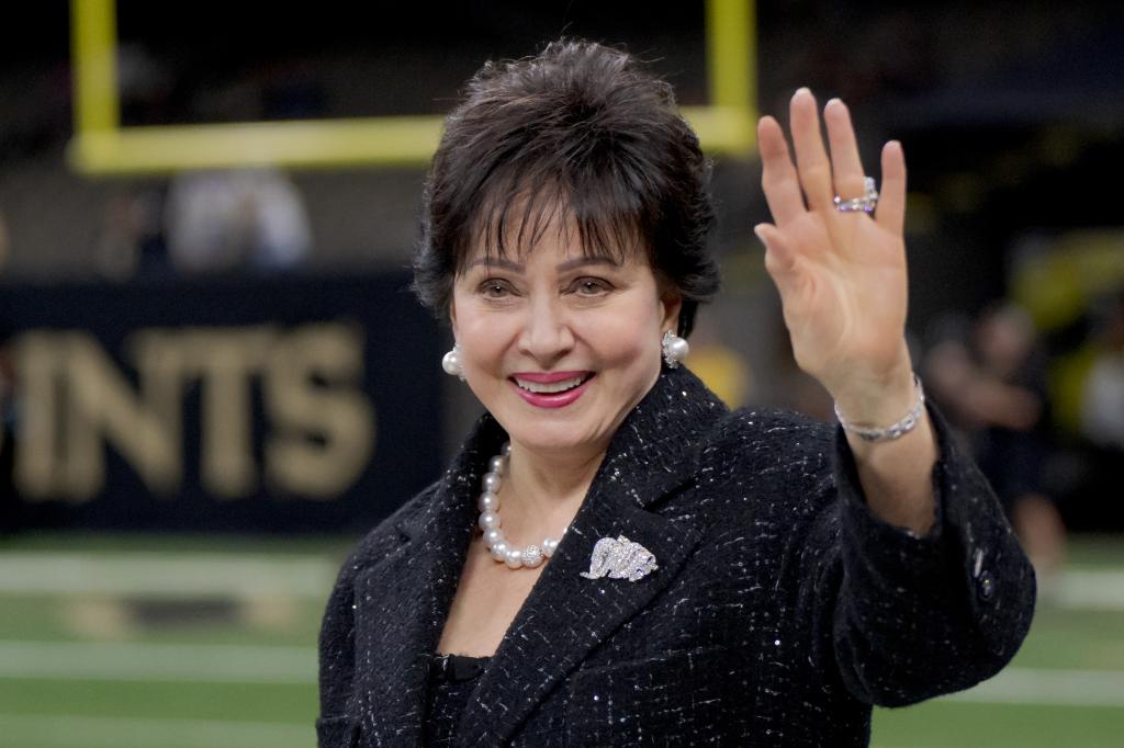 New Orleans Saints and Pelicans owner Gayle Benson walking the sideline at the Caesars Superdome before a game against the Los Angeles Rams
