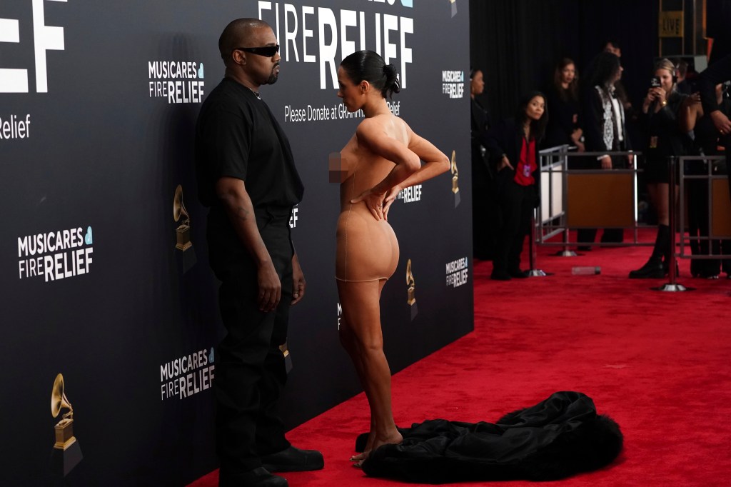 Bianca Censori bares her butt with Kanye West standing by.