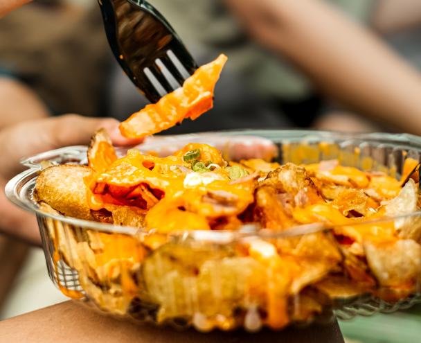 Using plastic fork to eat out of plastic takeout container