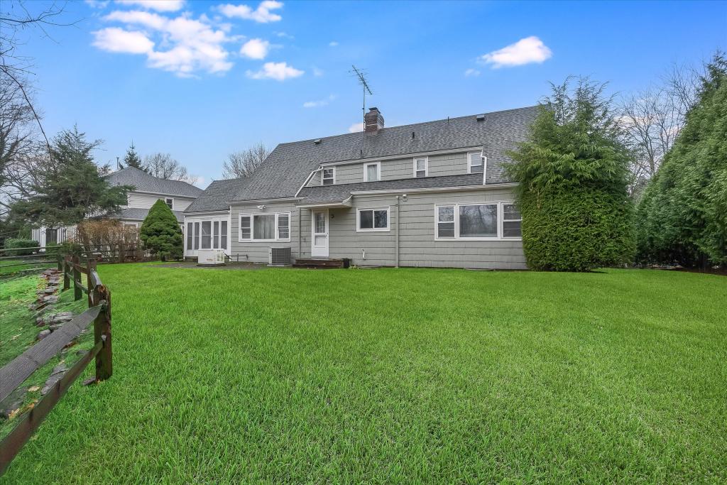 The rear of the four bed, two-and-a-half bath home.