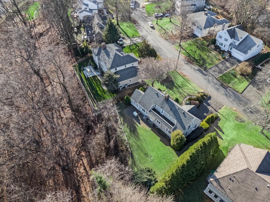 An aerial view of the home, which abuts an arboretum and bird sanctuary.