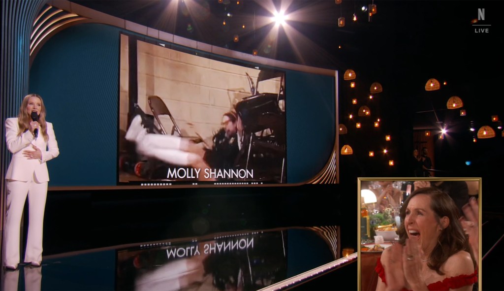 Kristen Bell playing a clip of Molly Shannon's "Superstar" role as Shannon reacts in the audience at the 2025 SAG awards. 