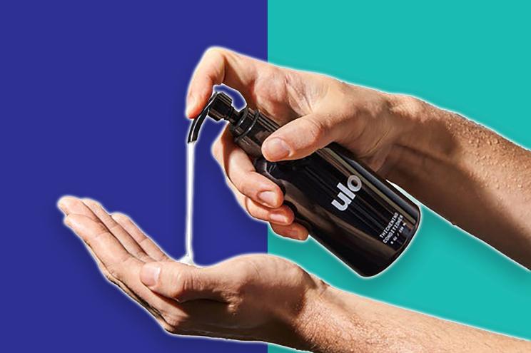 A person pouring liquid onto their hands