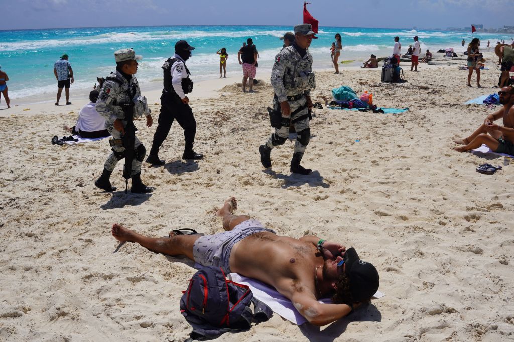 Mexican military members monitored the beach in Cancun during spring break 2023.