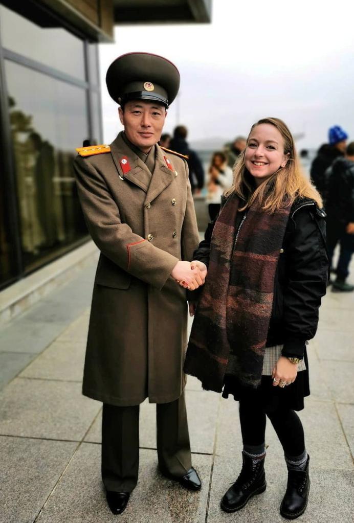 Stephens shaking hands with a North Korean military official.