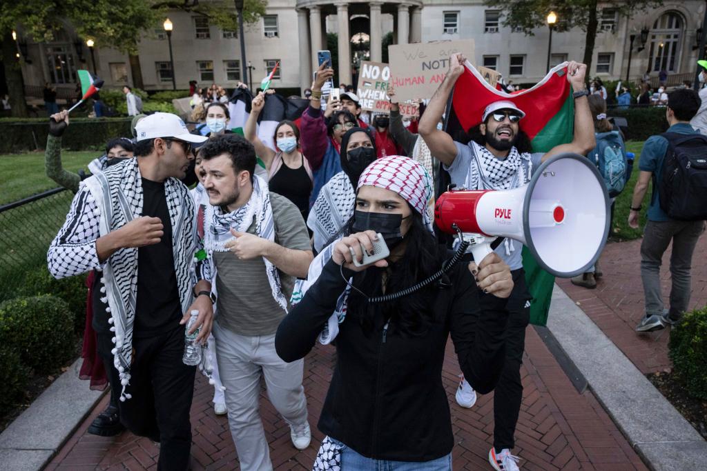 Mahmoud Khalil and other Palestinian supporters protesting at Columbia University in New York against Israeli airstrikes on the Gaza Strip in 2023