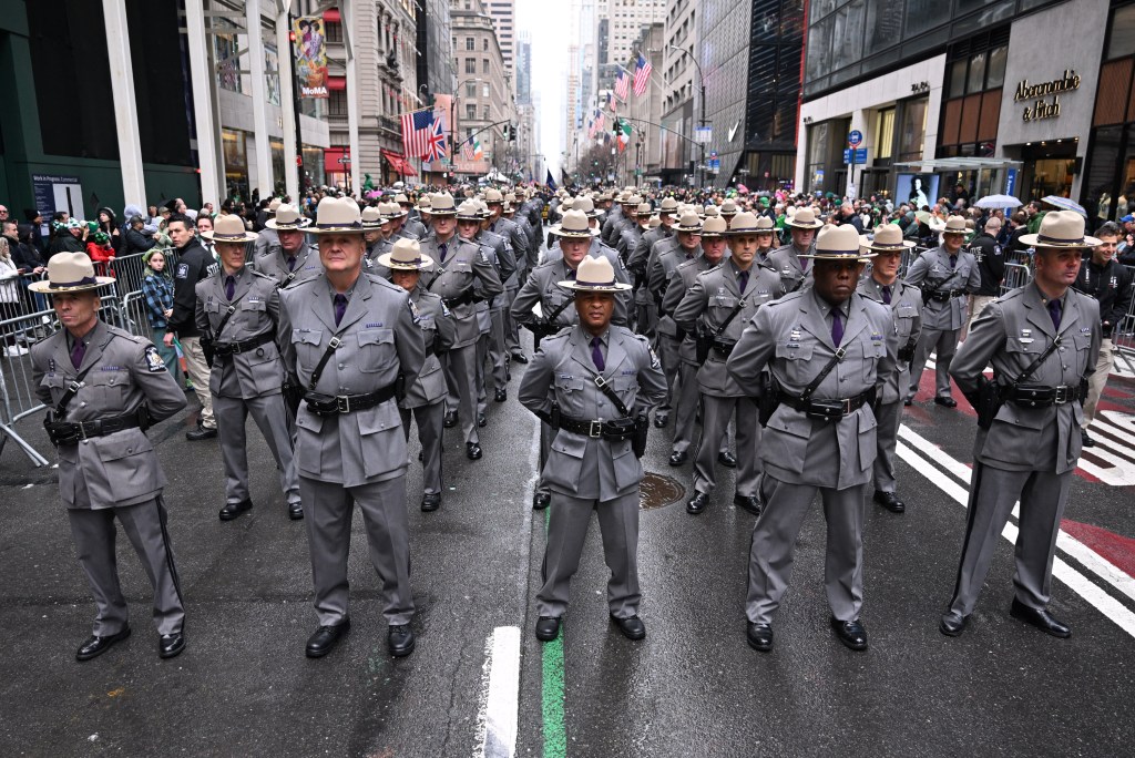 Members of New York State Police marching in the parade.
