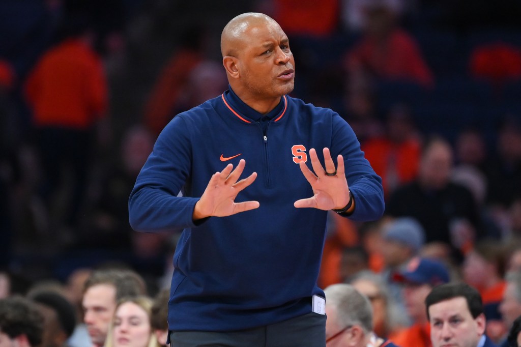 Syracuse Orange head coach Adrian Autry reacts to a call against the Virginia Cavaliers during the second half at the JMA Wireless Dome.