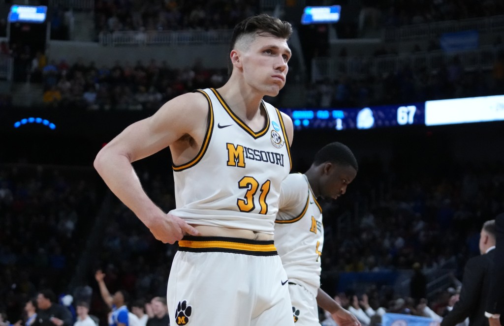 Missouri Tigers guard Caleb Grill (31) reacts after losing to the Drake Bulldogs in a first round menâs NCAA Tournament game at Intrust Bank Arena.