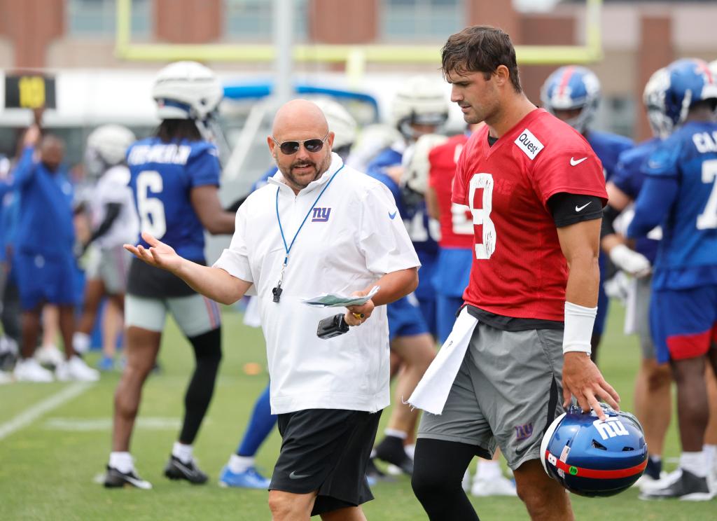 New York Giants head coach Brian Daboll speaking to New York Giants quarterback Daniel Jones #8, during practice at the New York Giants training facility in East Rutherford, New Jersey