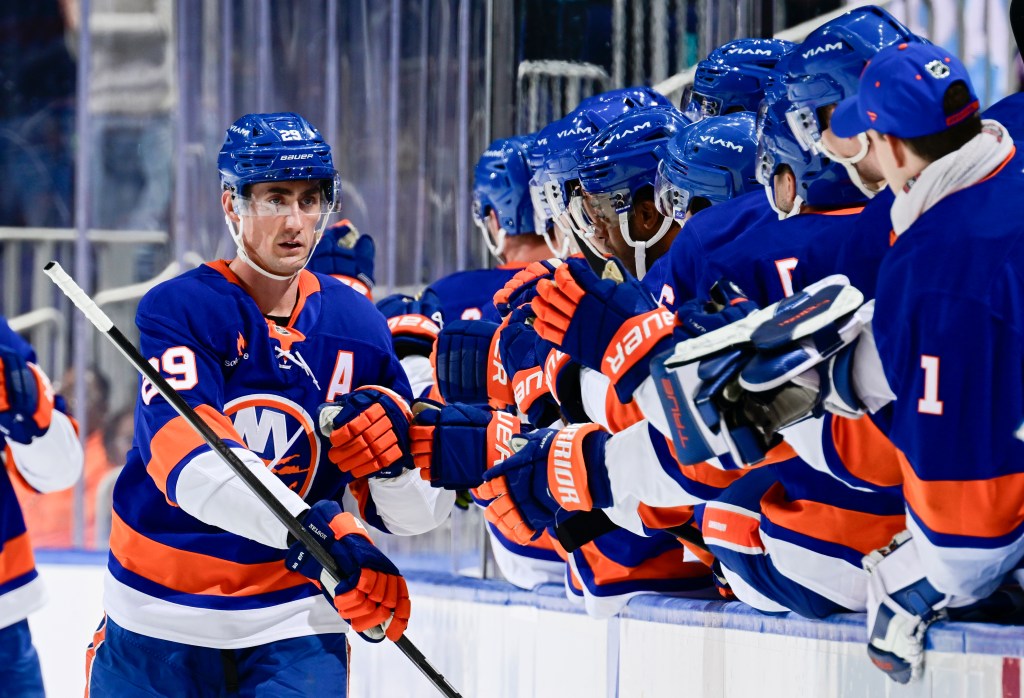 Brock Nelson celebrates with teammates after scoring a second period goal during the Islanders' 3-2 win over the Jets on March 4, 2025.