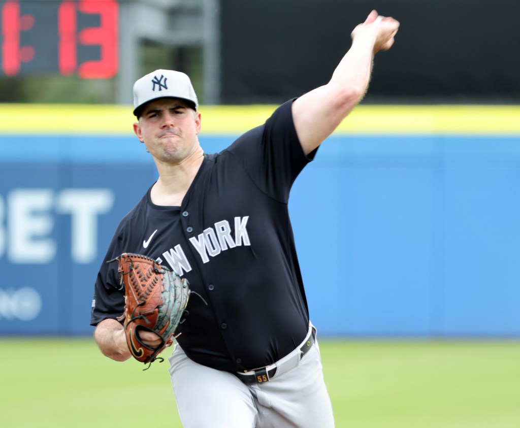 Carlos Rodon throws a pitch during a February spring training outing.