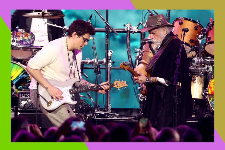 John Mayer (L) and Bob Weir perform in concert together.