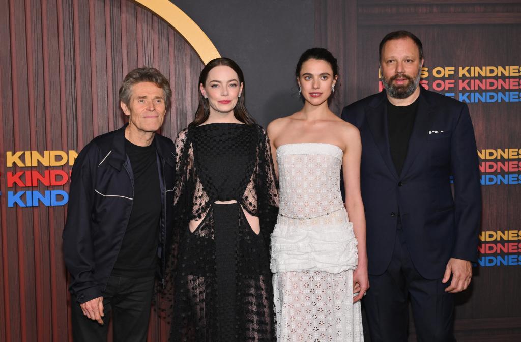 (L-R) Actor Willem Dafoe, actress Emma Stone, Greek director Yorgos Lanthimos and actress Margaret Qualley attend Searchlight's New York premiere of "Kinds of Kindness" at MOMA in New York, June 20, 2024. 