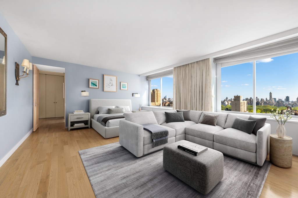The great room is filled with light and sweeping city skyline views