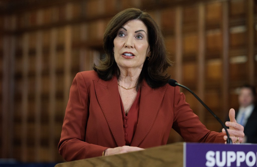 Governor Kathy Hochul standing at a podium while convening a domestic violence prevention roundtable with survivors, advocates, and law enforcement, in Albany, NY, on March 24, 2025.