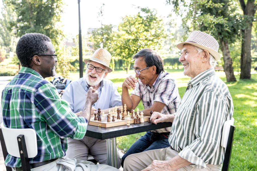 Group of senior friends playing chess game at the park. Lifestyle concepts about seniority and third age