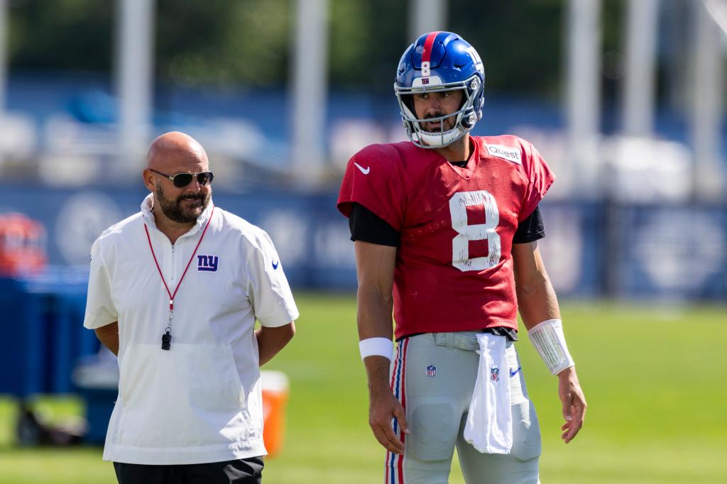 New York Giants head coach Brian Daboll speaks with quarterback Daniel Jones (8) during training camp at the Quest Diagnostics center, Tuesday, Aug. 13, 2024, in East Rutherford, New Jersey. 