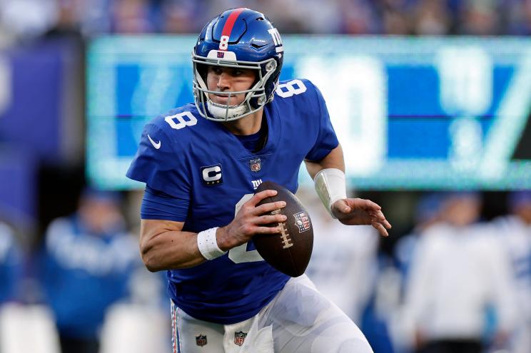New York Giants quarterback Daniel Jones runs with the ball against the Indianapolis Colts during an NFL football game, Jan. 1, 2023, in East Rutherford, N.J.