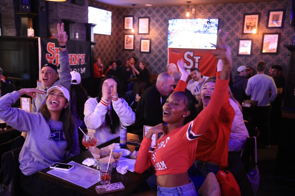 St. John's fans watch in New York on March 20, 2025.