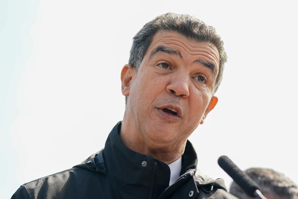 DOT Commissioner Ydanis Rodriguez speaking into a microphone 